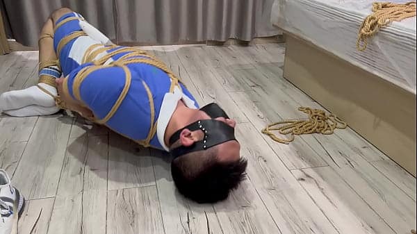 White socks hogtie, tapegagged and vibrated to cum