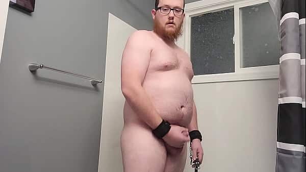 Bitchboy bondaged and fucks self in shower