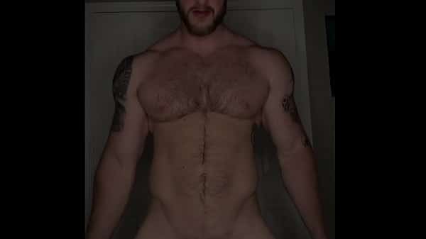 Hot muscle guy stretching his balls
